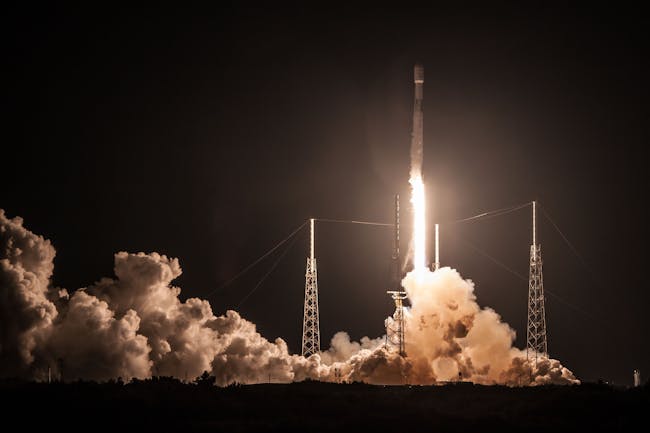 A star contrast of the Falcon 9 against the sky.