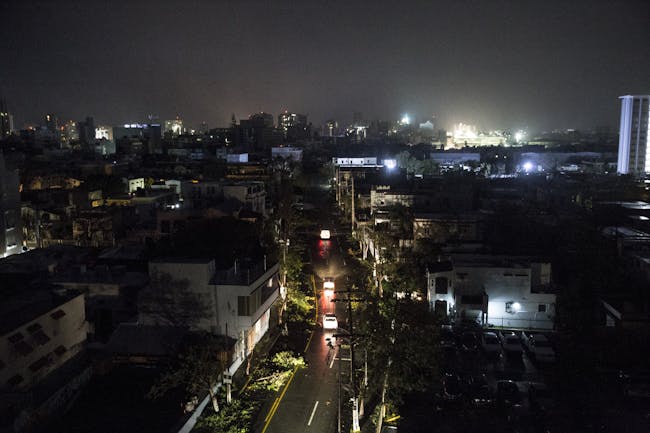 SAN JUAN, PUERTO RICO - SEPTEMBER 20: San Juan is seen during a total blackout after Hurricane Maria made landfall as a Category 4 storm on September 20, 2017 San Juan, Puerto Rico. Thousands of people have sought refuge in shelters, and electricity and phone lines have been severely impacted. Puerto Rico Governor Ricardo Rossello has announced a curfew, 6 p.m. to 6 a.m., effective Wednesday through Saturday. (Photo by Alex Wroblewski/Getty Images)