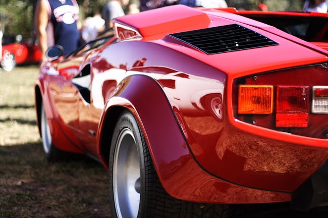 Is the driver of this red car adventurous?