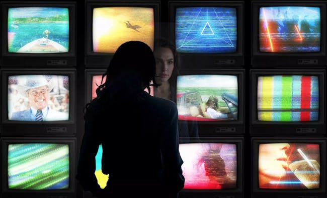 Wonder Woman watches TV.