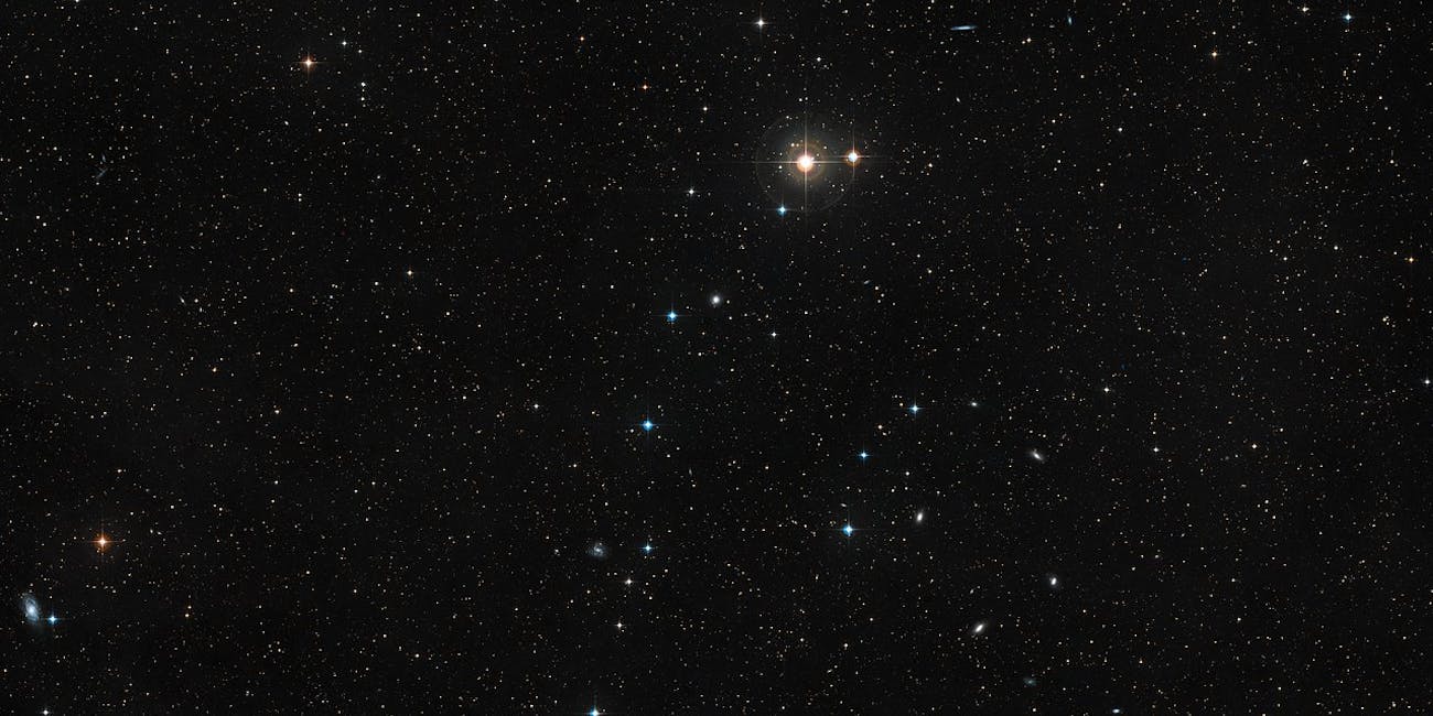 A view of the galaxy where this neutron star merger
took place.