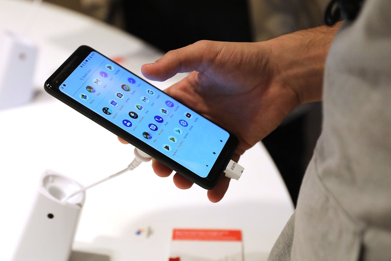 A man looks at Google's new Pixel 2 phones at a New York City pop-up shop on October 19, 2017 in New York City.