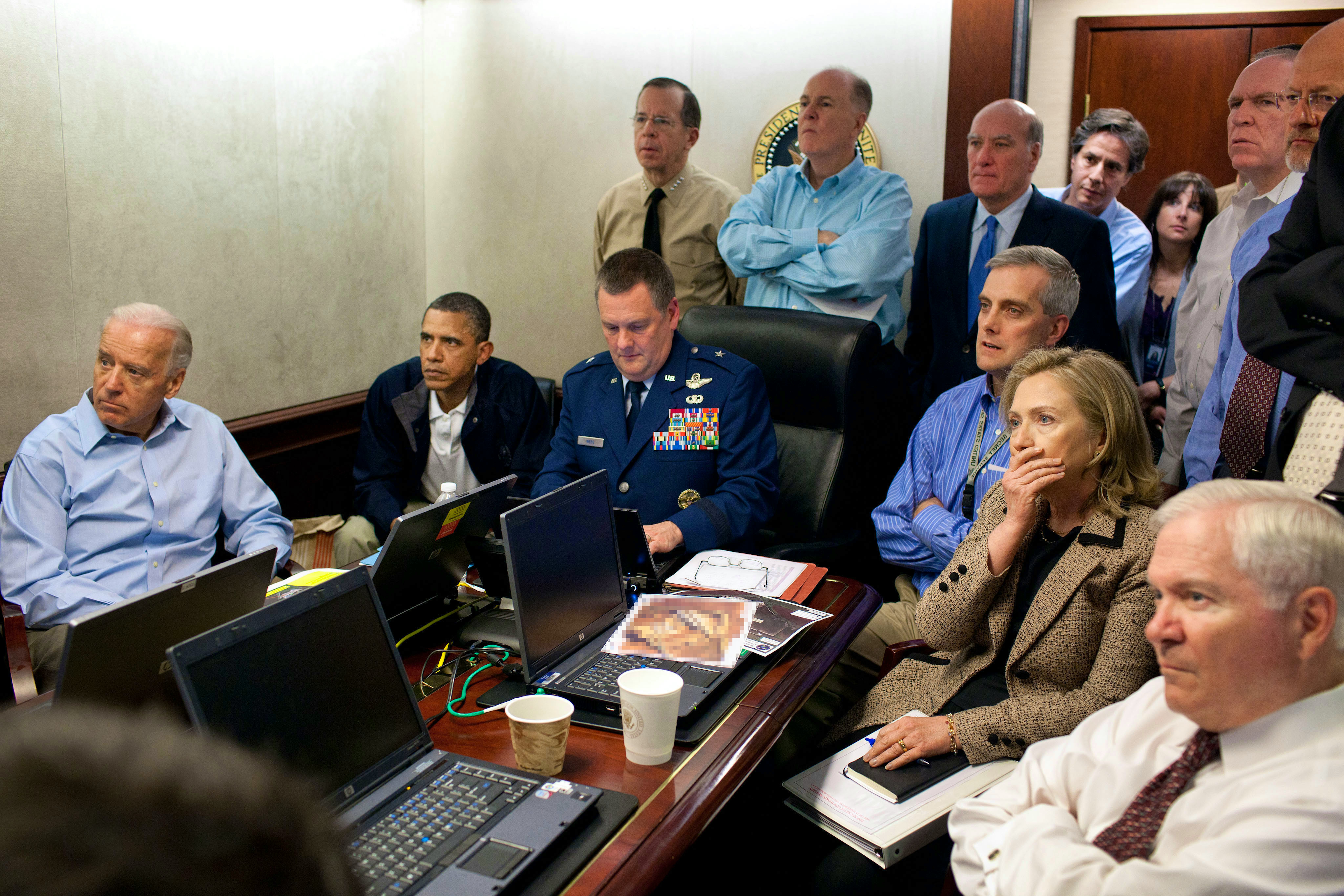 President Barack Obama, Vice President Joe Biden, Secretary of State Hillary Clinton and members of the national security team receive an update on the mission against Osama bin Laden in the Situation Room of the White House May 1, 2011 in Washington, DC. Obama later announced that the United States had killed Bin Laden in an operation led by U.S. Special Forces at a compound in Abbottabad, Pakistan. 