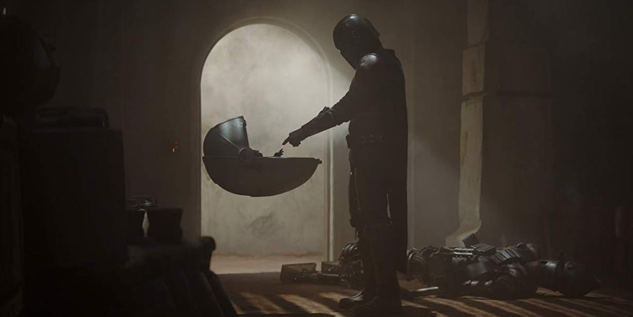 Baby Yoda and The Mandalorian meet in 'The Mandalorian' on Disney Plus