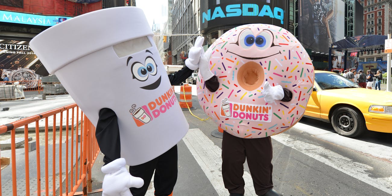 NEW YORK, NY - JUNE 06: Dunkin' Donuts mascots appear at the Dunkin' Donuts National Donut Day 2014 at NASDAQ on June 6, 2014 in New York City. (Photo by Slaven Vlasic/Getty Images for Dunkin' Donuts)