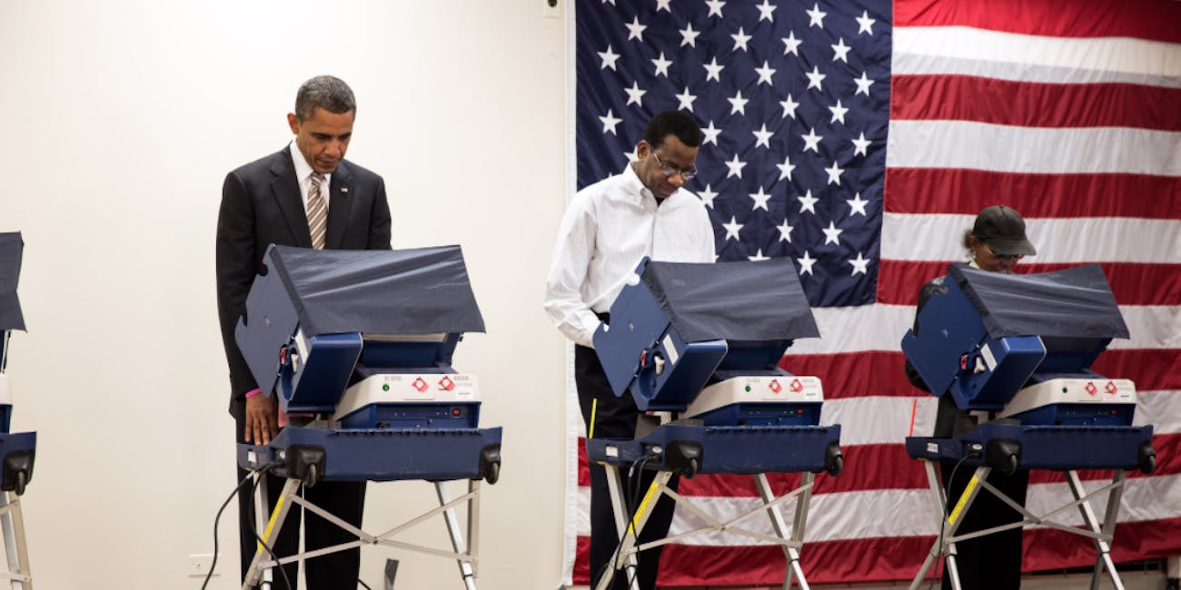 Barack Obama votes in 2012.