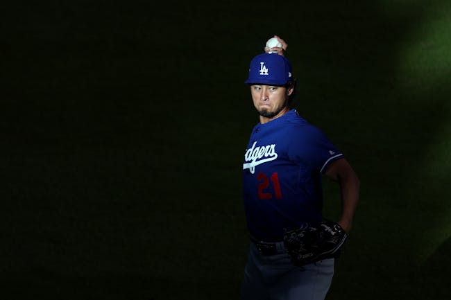 HOUSTON, TX - OCTOBER 29: Yu Darvish #21 of the Los Angeles Dodgers warms up before game five of the 2017 World Series against the Houston Astros at Minute Maid Park on October 29, 2017 in Houston, Texas. (Photo by Tom Pennington/Getty Images)