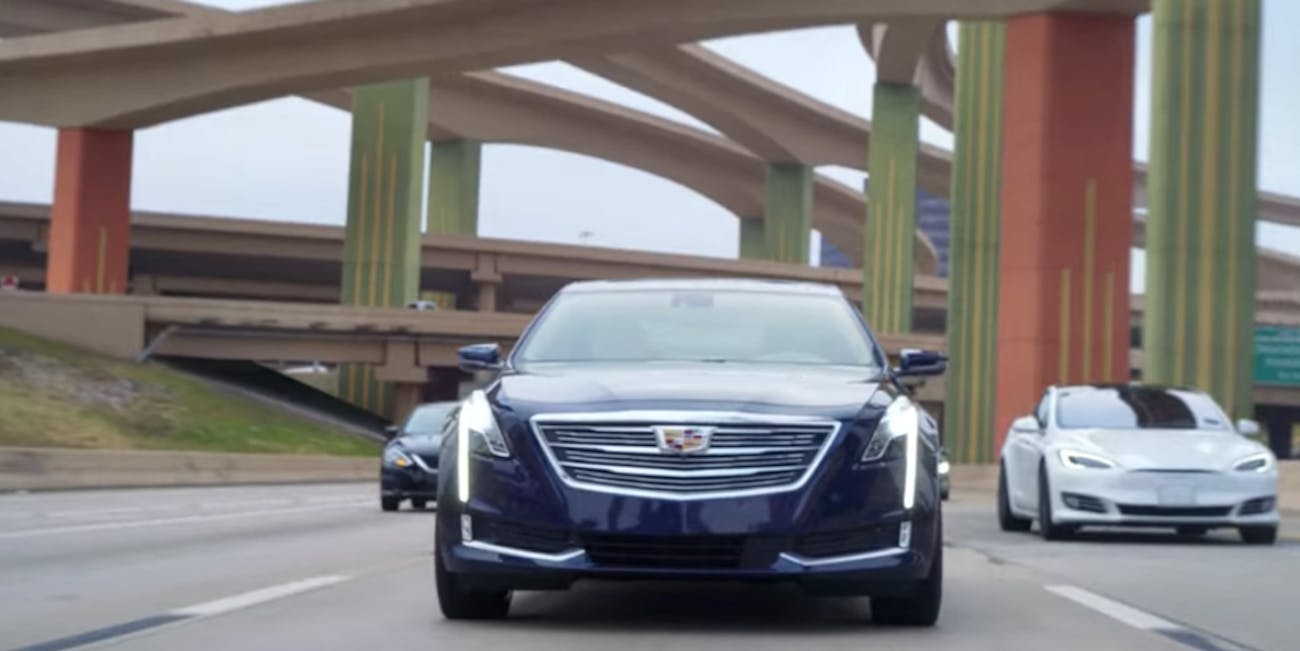 Did Gm Try To Dunk On Tesla Autopilot In Its Cadillac Ad Campaign Cadillac Driving Down The Road