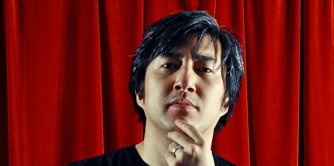 Goichi "Suda51" Suda looks on imposingly, obviously thinking about game design.