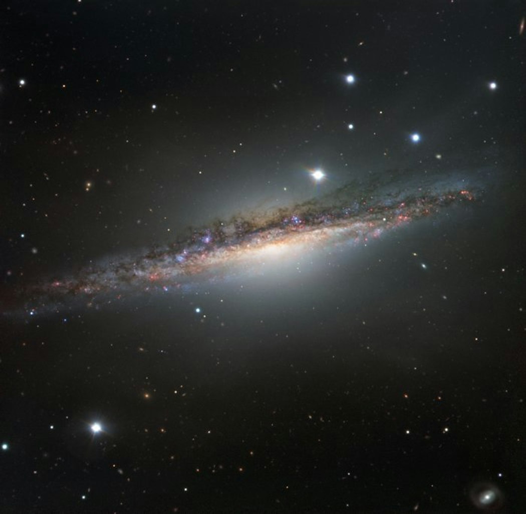 In this edge-on view of NGC 1055, scientists are able to see what a galaxy is really made of. 
