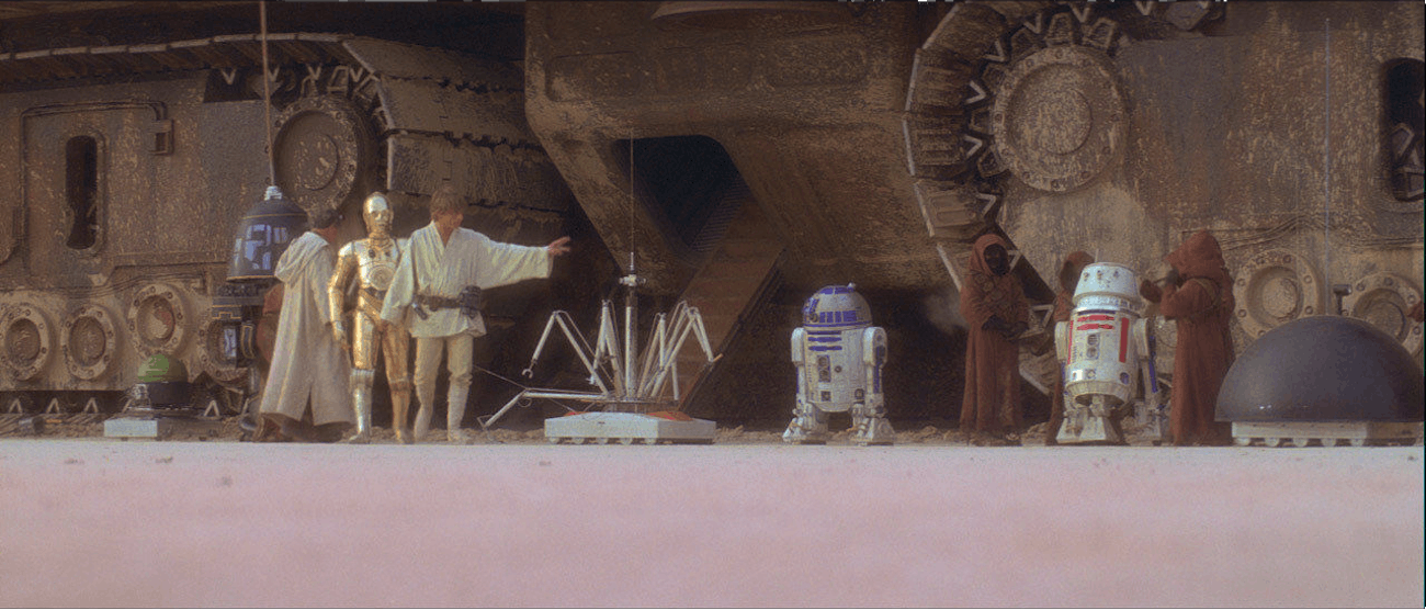 C-3PO and Luke Skywalker in 'Star Wars'