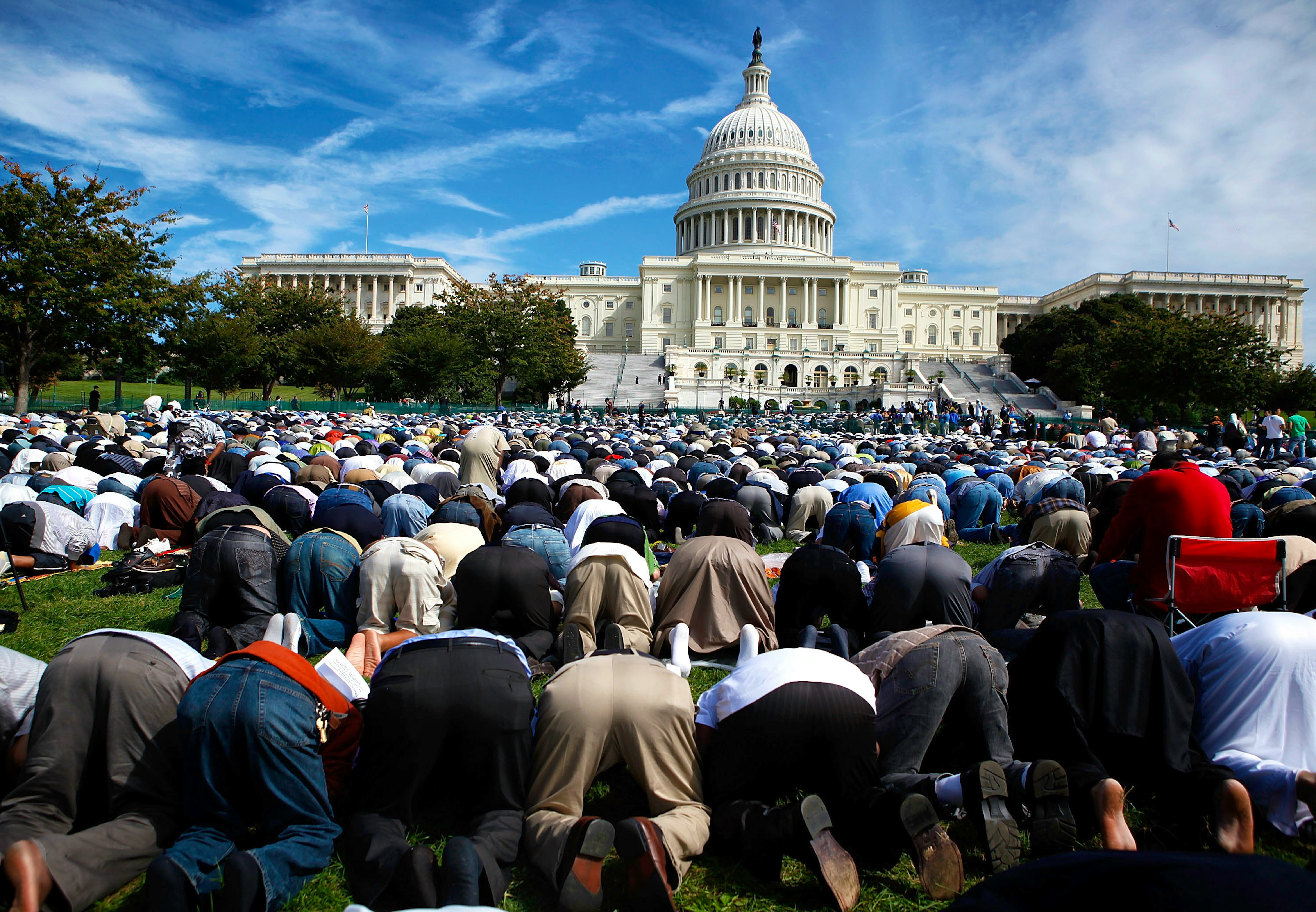 Muslims say prayer during the 'Islam on Capitol Hill 2009' event at the West Front Lawn of the U.S. Capitol September 25, 2009 in Washington, DC. Thousands of Muslims gathered for the event to promote the diversity of Islam.