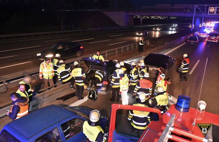 Firefighters in Munich, Germany, respond to the crash where a Tesla Model S stopped an out of control Volkswagen Passat.