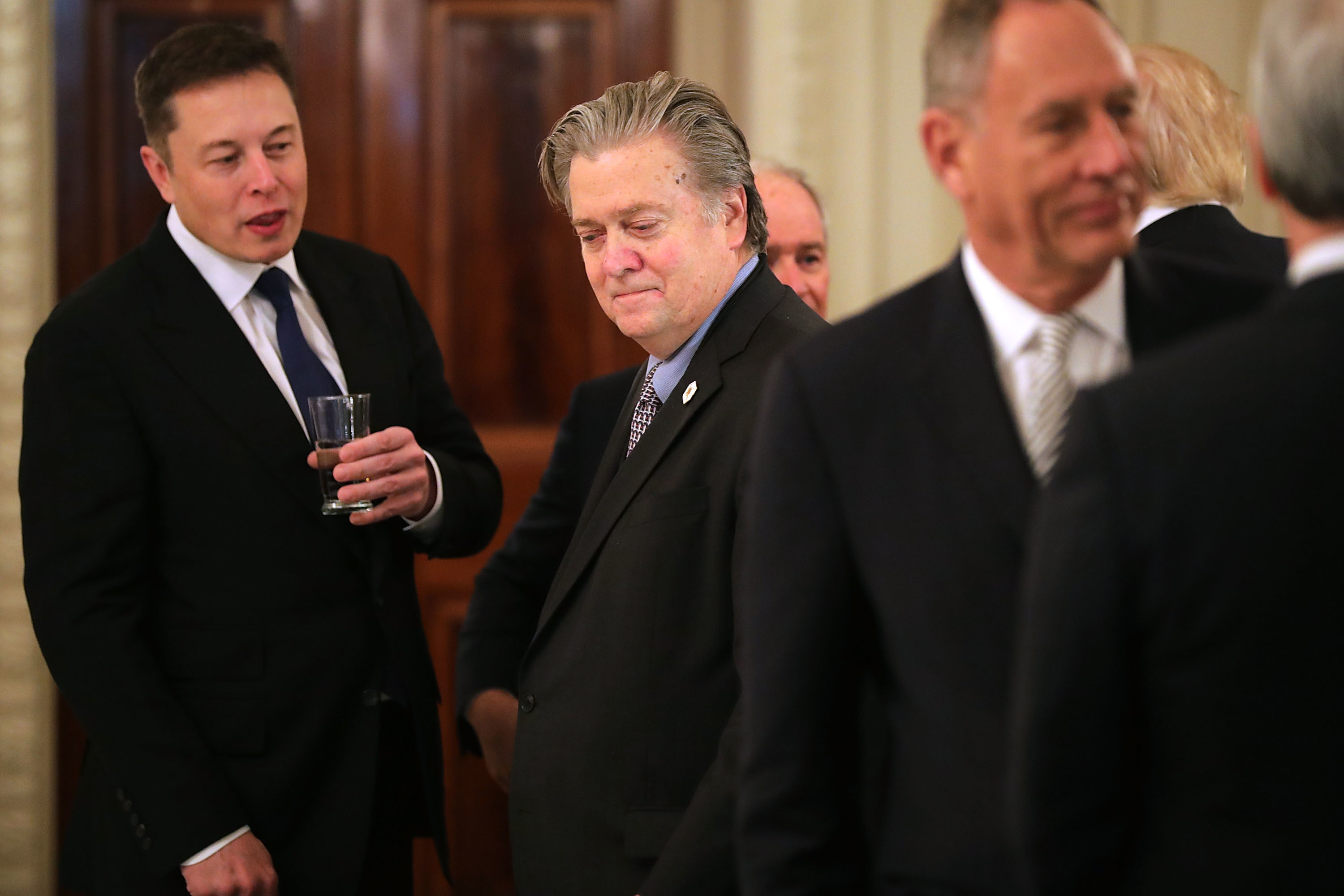 What Is Elon Musk Telling Steve Bannon In This Photo? A Few Guesses ...