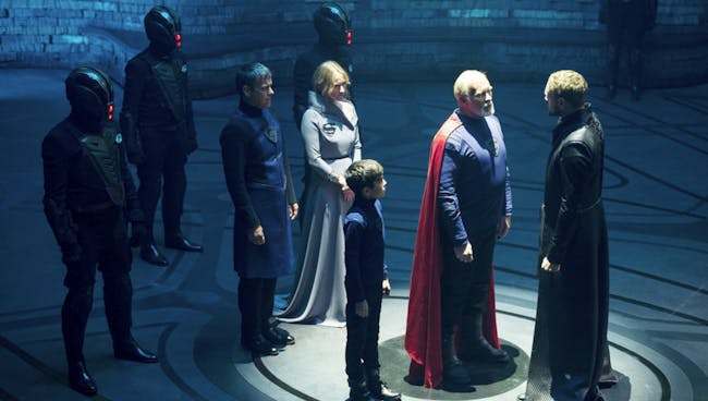 Superman's great-great grandfather Val-El (Ian McElhinney) faces a death sentence as Charys-El (Paula Malcomson), young Seg-El and his father (Rupert Graves) look on.