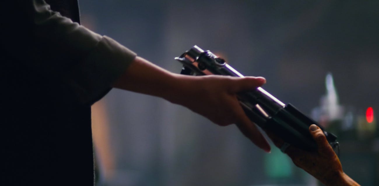 Maz hands Leia Luke's first lightsaber in the trailer for 'The Force Awakens.'