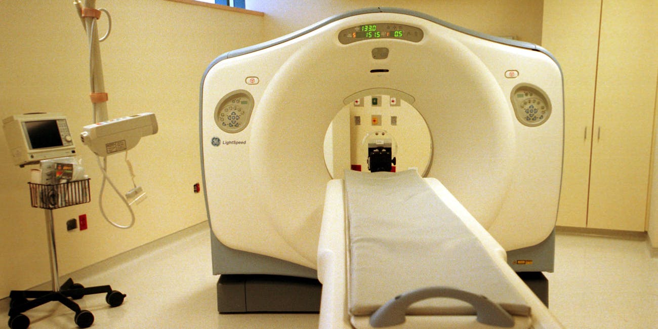 CT scan computerized tomography doctor office medicine AI 69