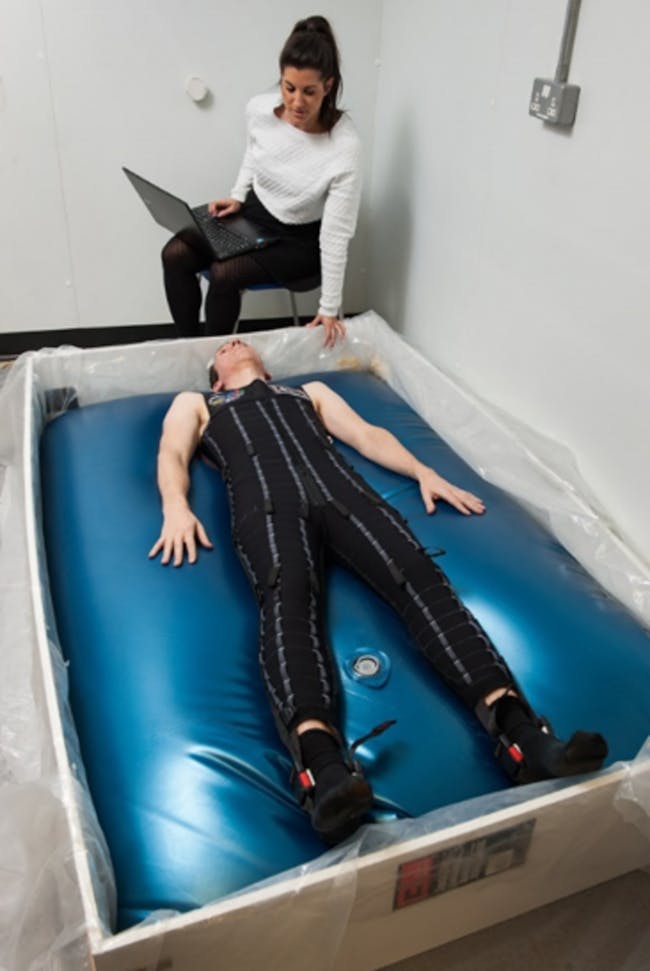 Researchers at King’s College London, UK employing a novel simulation of microgravity: adding magnesium salts to a half-filled waterbed. They were inspired by the Dead Sea, where swimmers float on the surface because of the high salt content. This Hyper Buoyant Facility is used to test a new Skinsuit design, which adds gravity-like loading to the bodies of astronauts in orbit.x