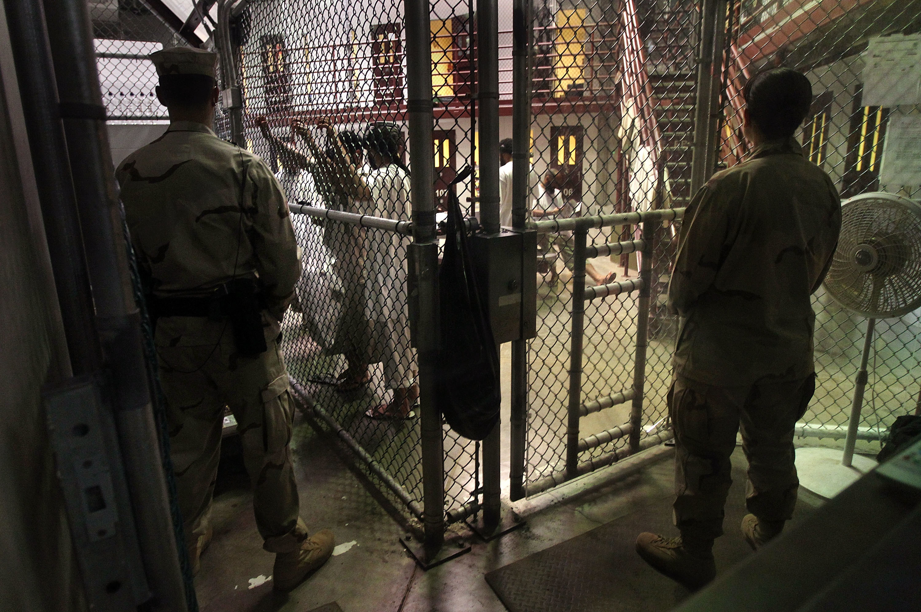 U.S. military guards watch detainees at Camp 6 in the Guantanamo Bay detention center. 