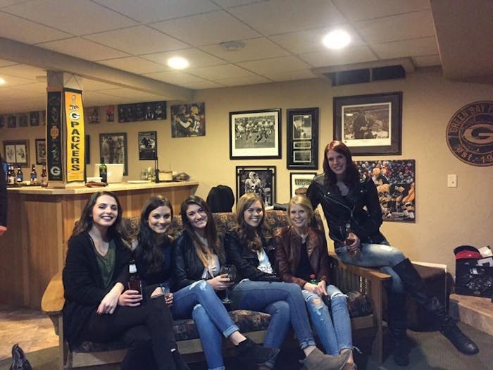 The optical illusion here is that the girl second from the left has no legs.