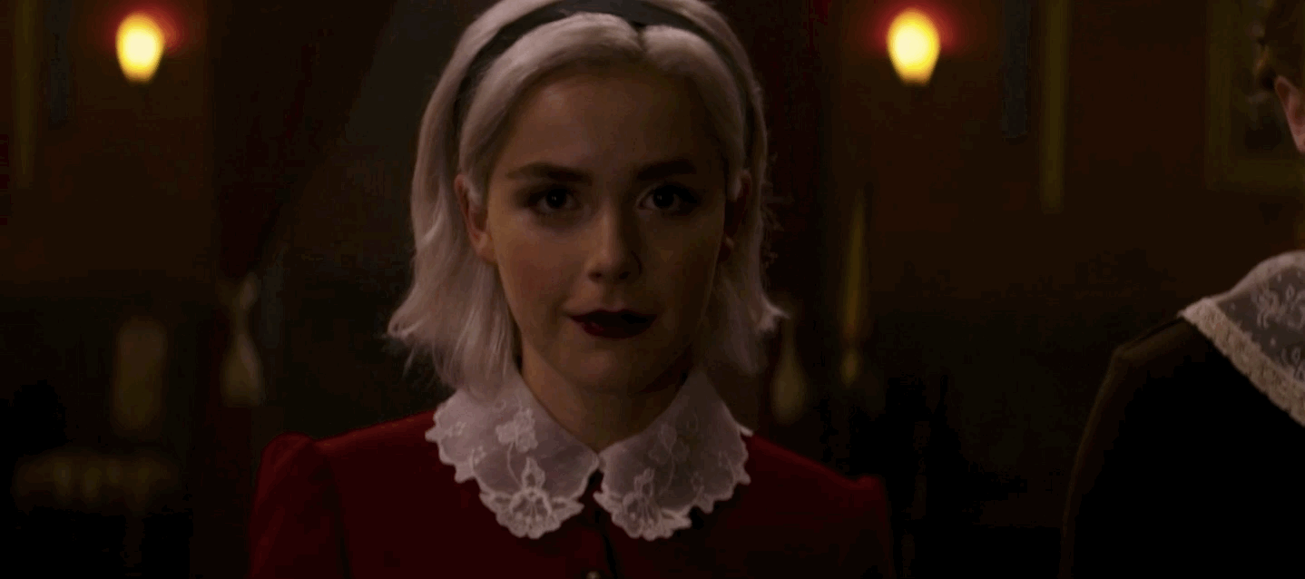 sabrina-winking-at-nicholas-in-the-academy-of-unseen-arts.gif