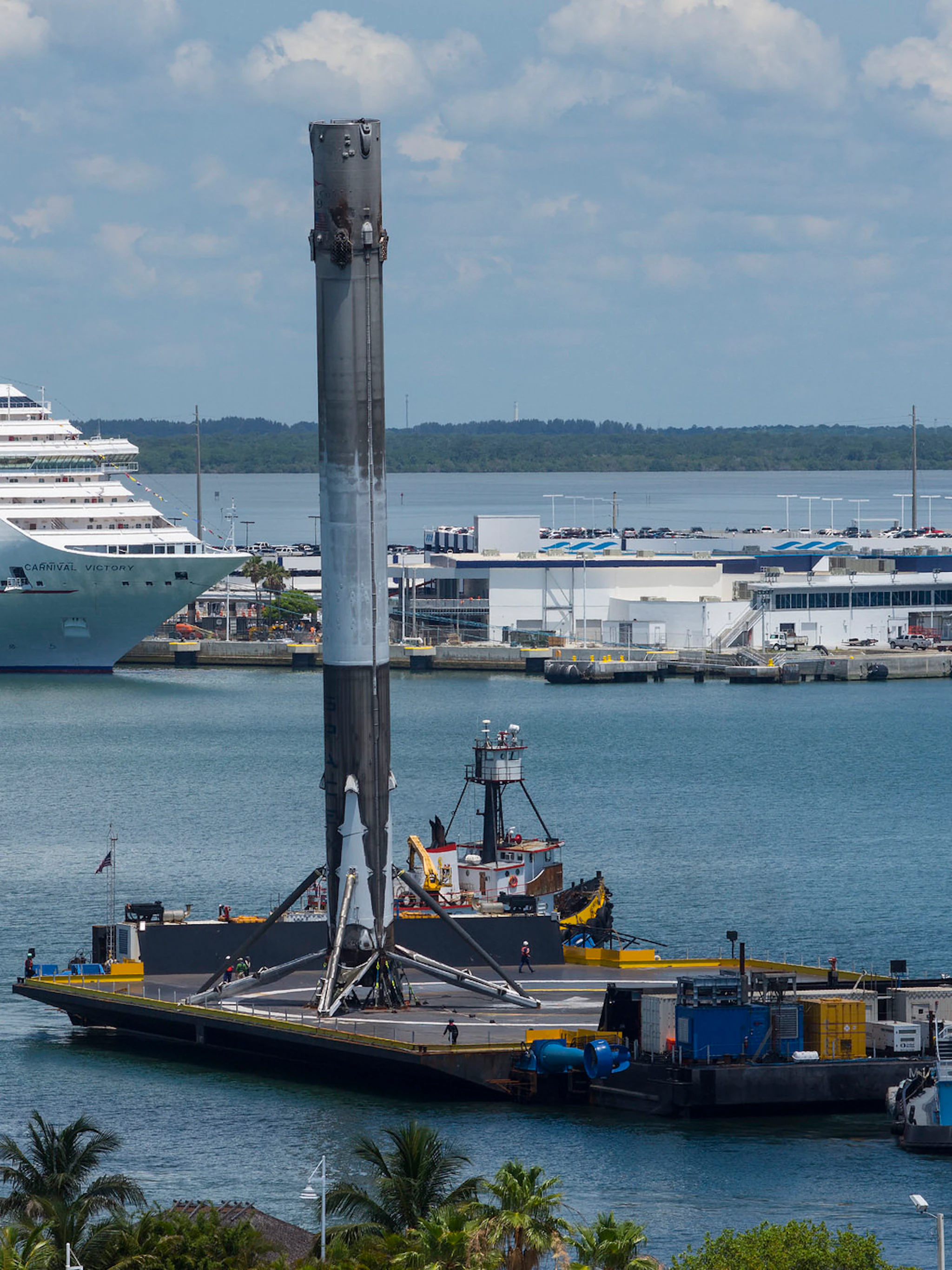 SpaceX Releases Photos of Tilted Falcon 9 Rocket Floating Back to Port ...
