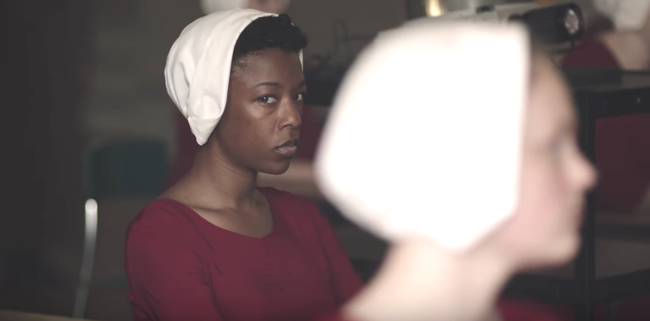 https://fsmedia.imgix.net/a4/3e/33/d1/d44f/47c6/a0f8/c38a5fe2b920/samira-wiley-as-moira-in-the-handmaids-tale.png