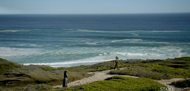 Luke Arnold as John Silver and Zethu Dlomo as Madi Scott