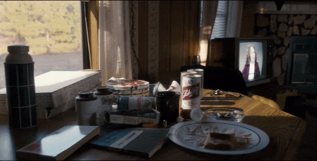 Netflix 'Stranger Things' WIYZ anchor Brenda Wood on the TV in Hopper's trailer.