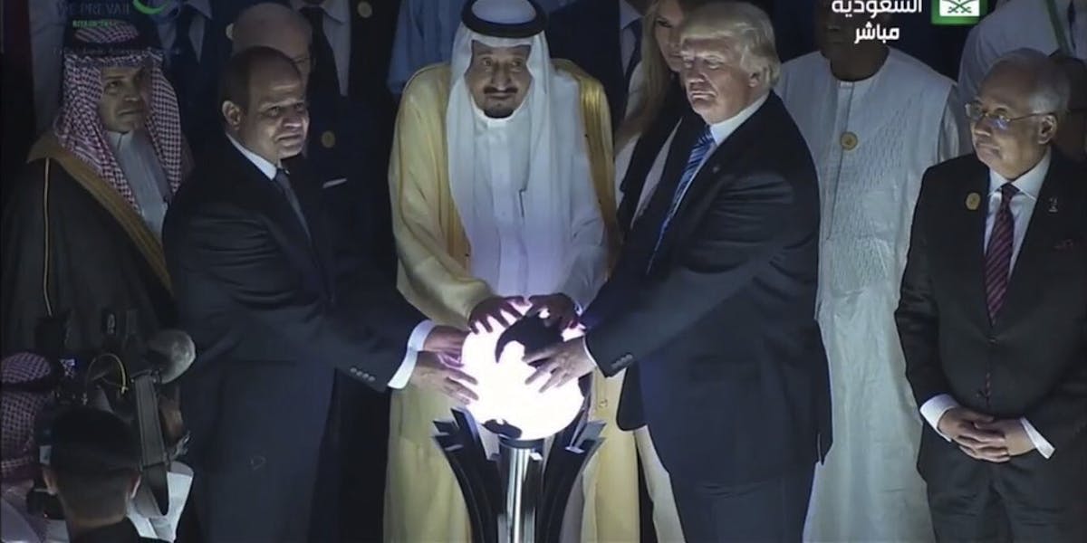 https://fsmedia.imgix.net/ab/9a/61/0b/c61d/4873/9a3f/30c5f97077c2/trump-touched-a-glowing-orb-in-saudi-arabia-and-the-internet-is-freaked-out.png?rect=0%2C67%2C1020%2C510&auto=format%2Ccompress&w=1200