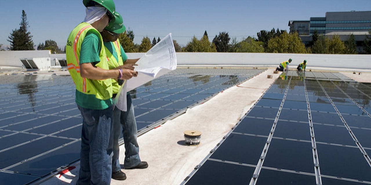 Solar energy Walmart installation rooftop photovoltaic panels corporate green energy