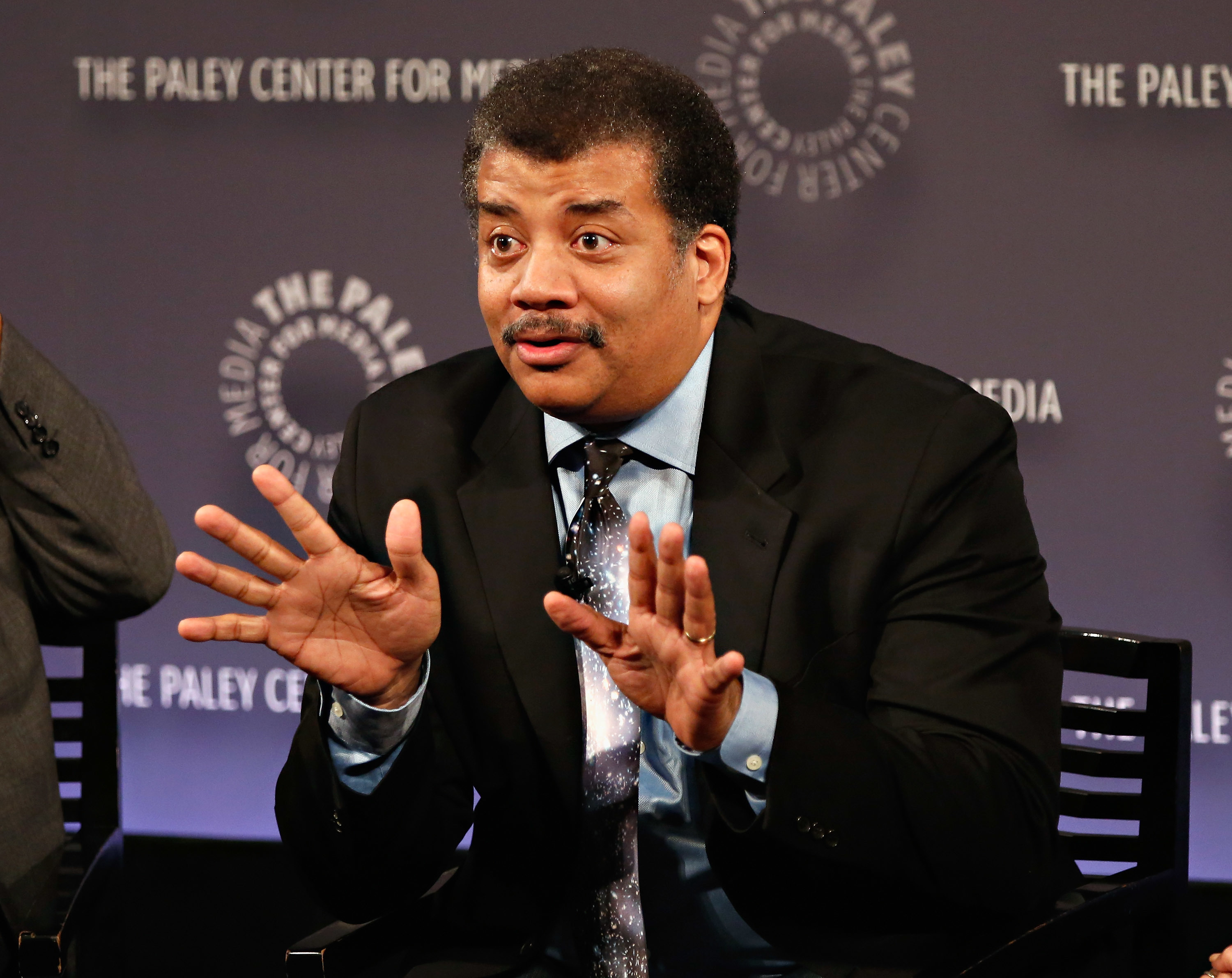 neil degrasse tyson holding shirt