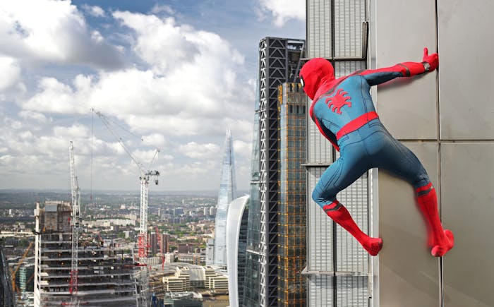 Scaling the side of the Heron Tower.
