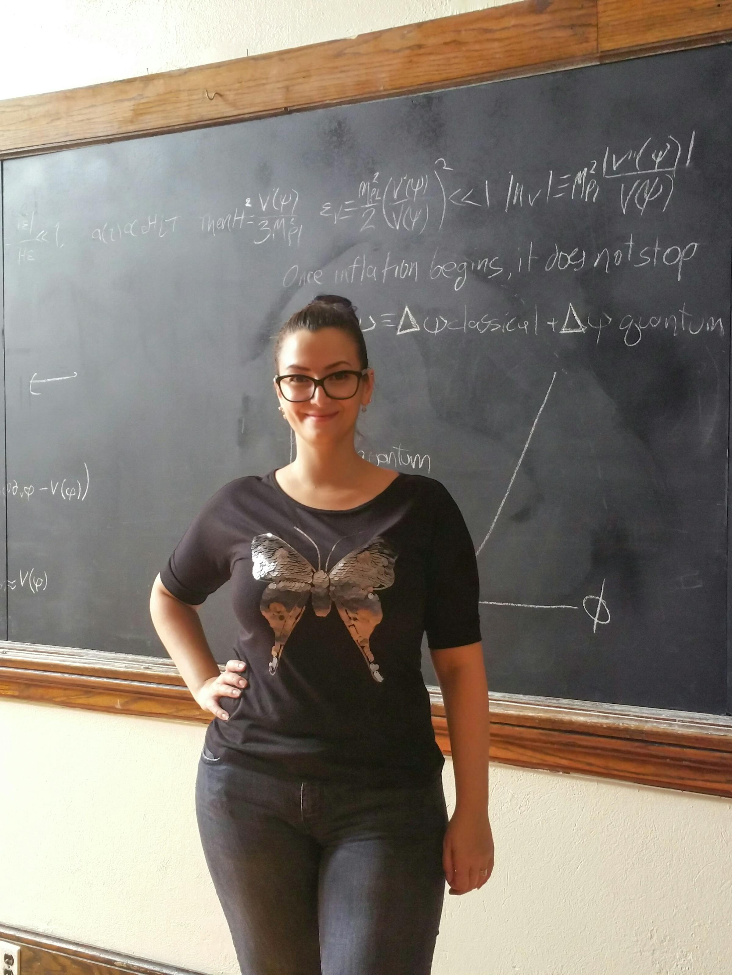 Sophia Nasr on the '12 Monkeys' set, in front of the chalk board with the equations she prepared.