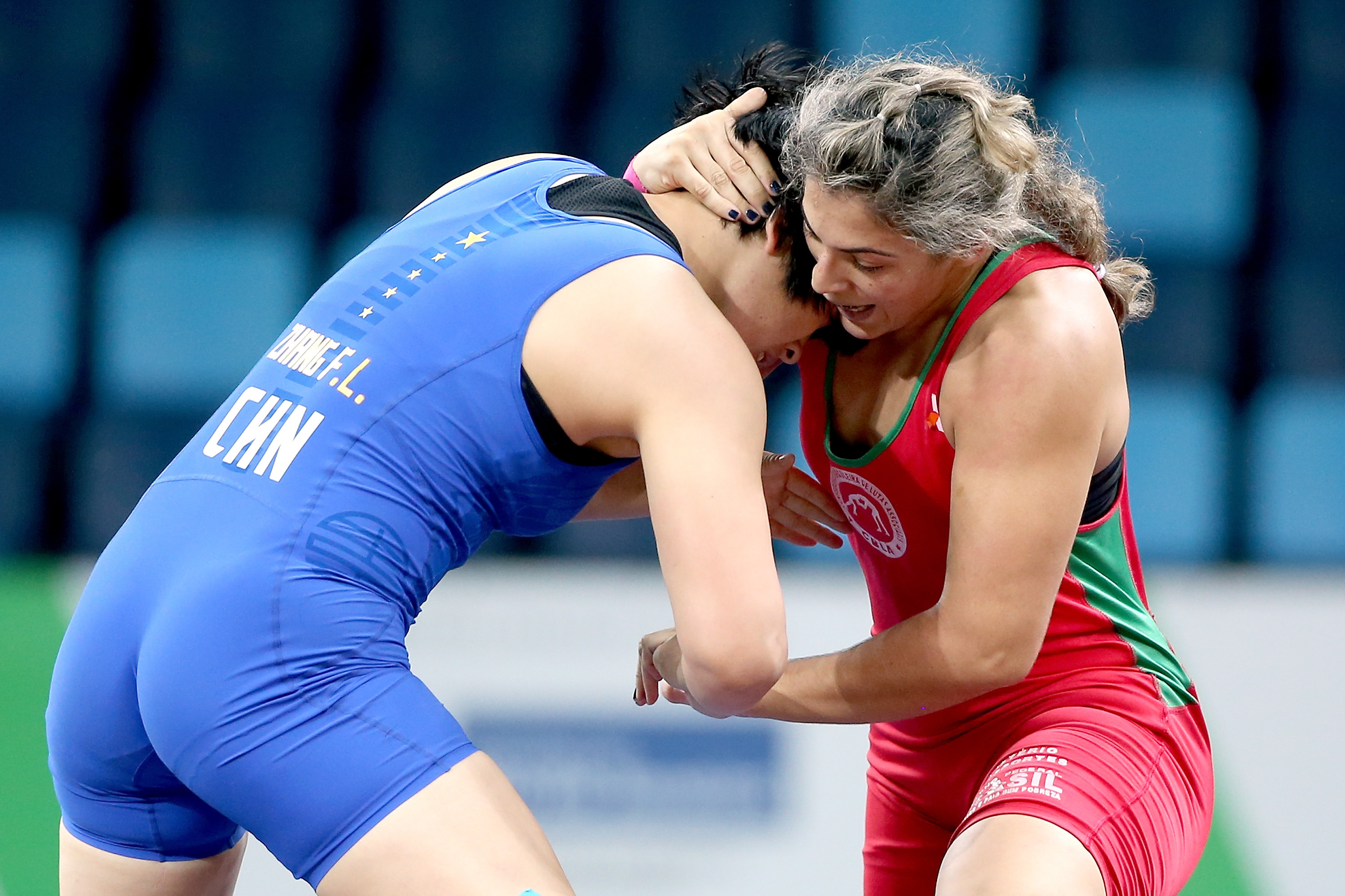 Wear Red To Win Gold Rio Olympics 2016 Inverse   Fengilu Zhang Blue Of China Wrestles Keila Cristiana Silva Red Of Brazil During The Womens Wres 