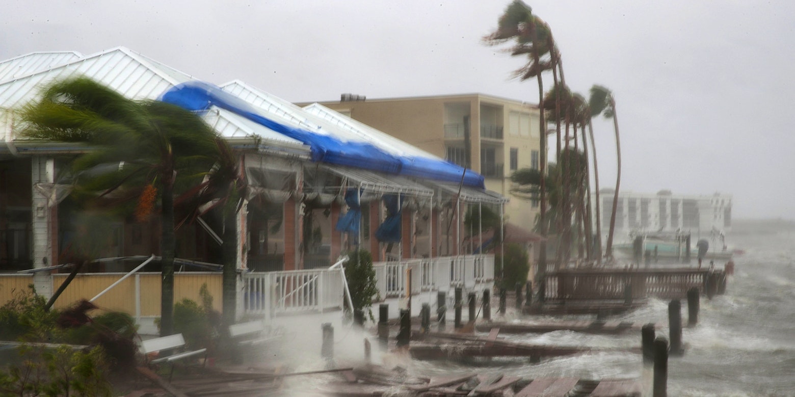 Heavy waves caused by Hurricane Matthew pound the boat docks at the Sunset Bar and Grill, October 7, 2016 on Cocoa Beach, Florida.