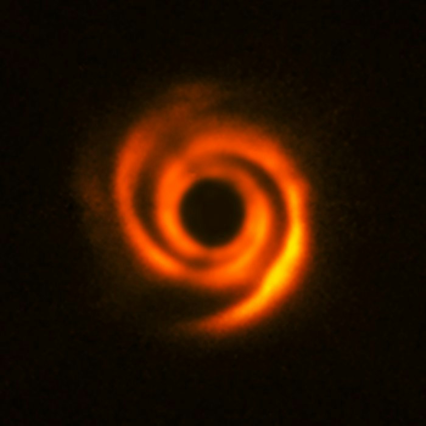 Arm-like spiral structures on the disk around star HD 135344B.