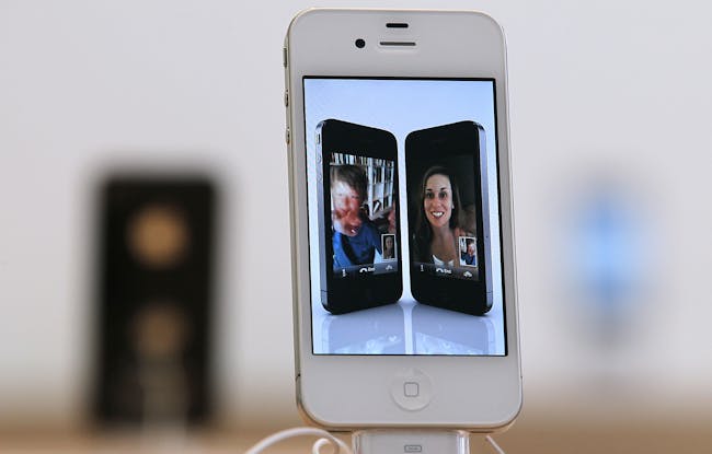 A then-current iPhone 4 on display in 2011.