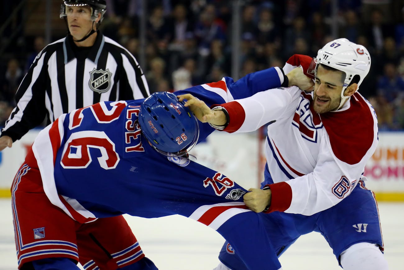 NEW YORK, NY - APRIL 22: Jimmy Vesey #26 of the New York Rangers fights with Max Pacioretty #67 of the Montreal Canadiens during the first period in Game Six of the Eastern Conference First Round during the 2017 NHL Stanley Cup Playoffs at Madison Square Garden on April 22, 2017 in New York City. (Photo by Bruce Bennett/Getty Images)