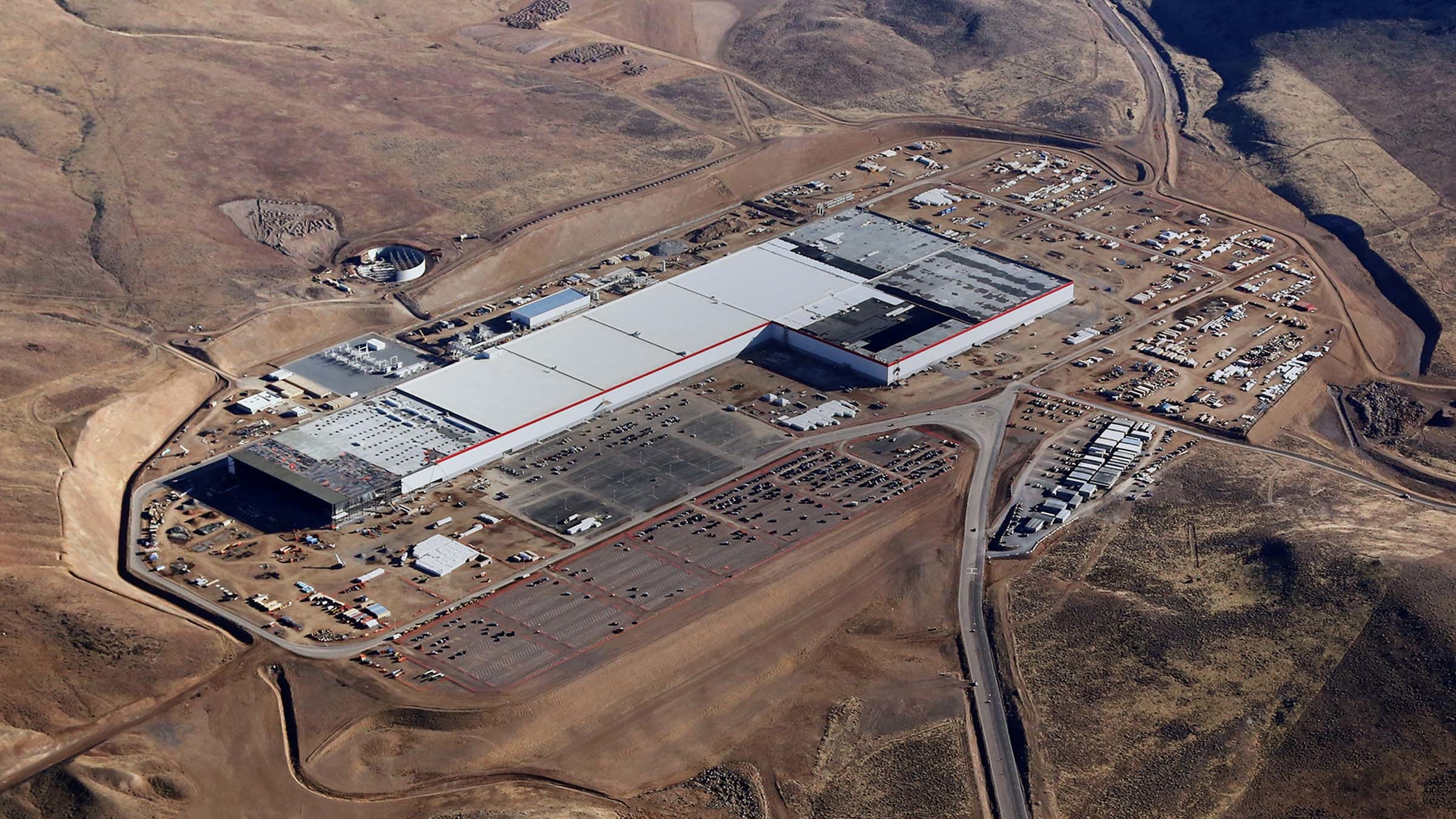 teslas-gigafactory-from-the-air-on-wednesday-the-company-announced-it-had-started-producing-batte.jpeg