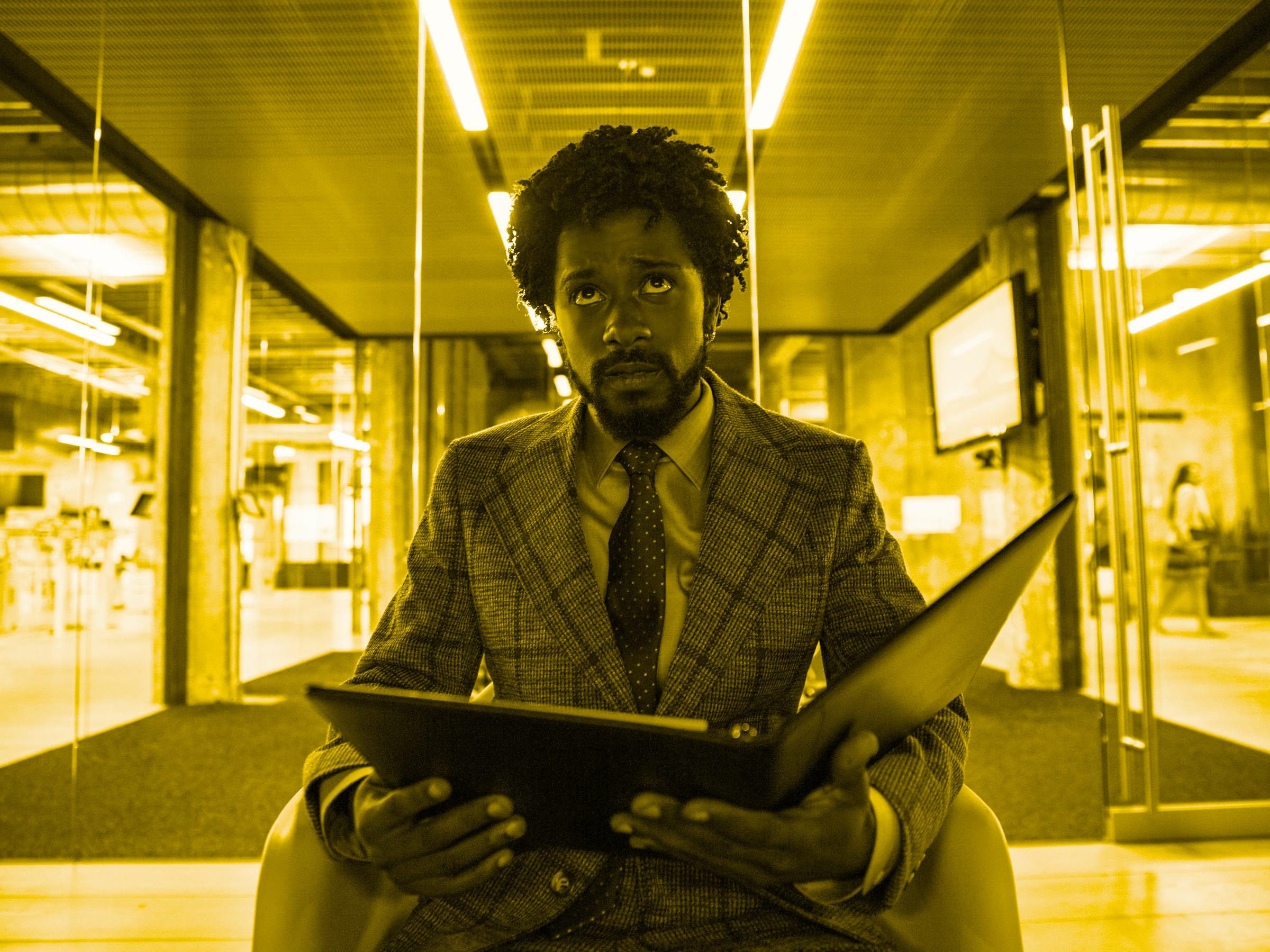 Lakeith Stanfield as Cassius "Cash" Green becomes a "power caller" in 'Sorry to Bother You'.