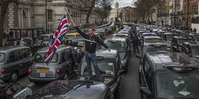 London Taxi drivers stage a protest on Whitehall on February 10, 2016 in London, England. Drivers are claiming that Uber is not subjected to the same stringent regulation requirements as they are and that deregulation of the trade has compromised passenger safety.