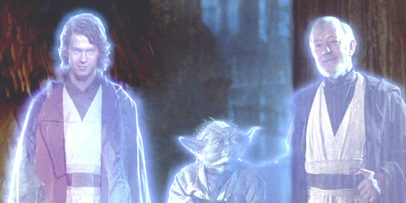 Anakin Skywalker, Yoda, and Obi-Wan Kenobi in Force ghost form at the end of 'Return of the Jedi'.